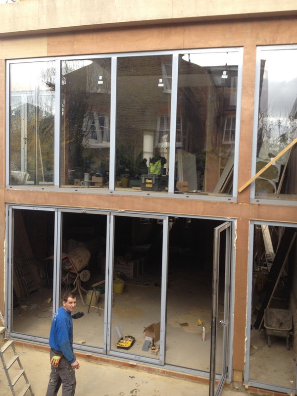 Aluminium bi-fold doors with two-storey glazing in Clerkenwell