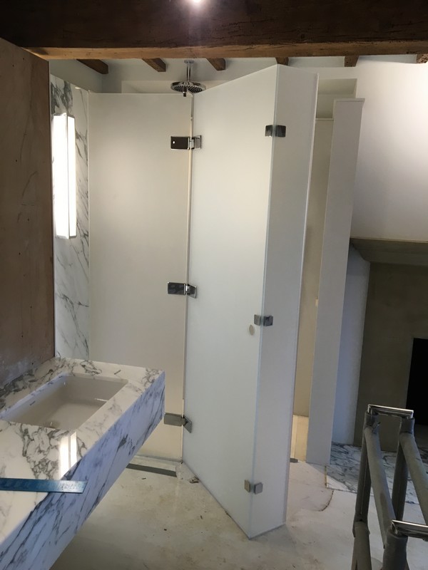 Bespoke frosted glass shower enclosure in Clerkenwell luxury bathroom