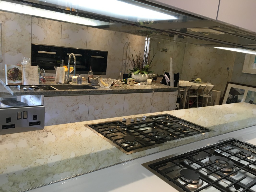 Mirror glass splashback in Clerkenwell luxury kitchen